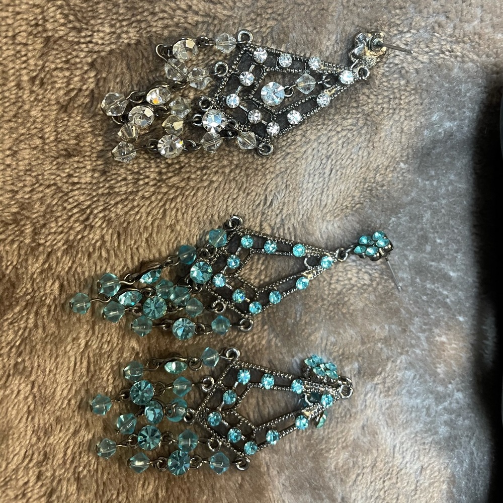 2 sets of teal and crystal earrings